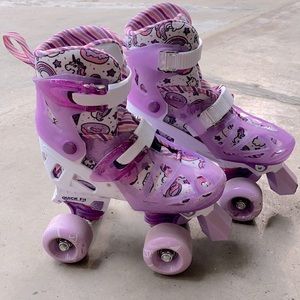 Kids, adjusting sizes 12-2, roller skates.